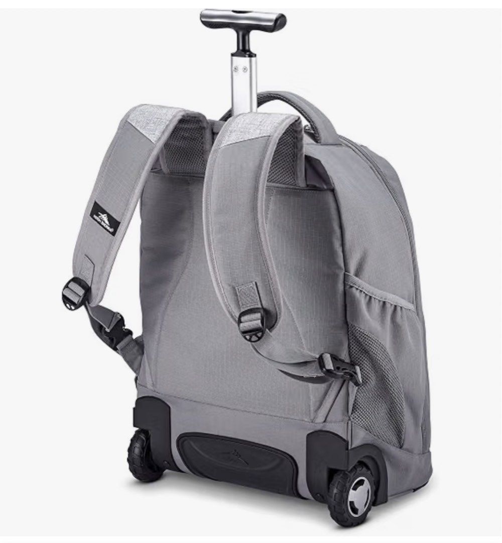 High Sierra Wheeled Backpack Gray (Category: Backpacks) located in Quezon City. Submitted by modernbabies (Listing ID 1470212839, Image 3). Description: - Brand new with tags, still in original plastic packaging - Versatile gray High Sierra wheeled backpack - Telescoping handle and smooth-rolling wheels for easy travel - Padded shoulder straps conveniently tuck away when rolling - Spacious main compartment with dedicated laptop space - Front orga