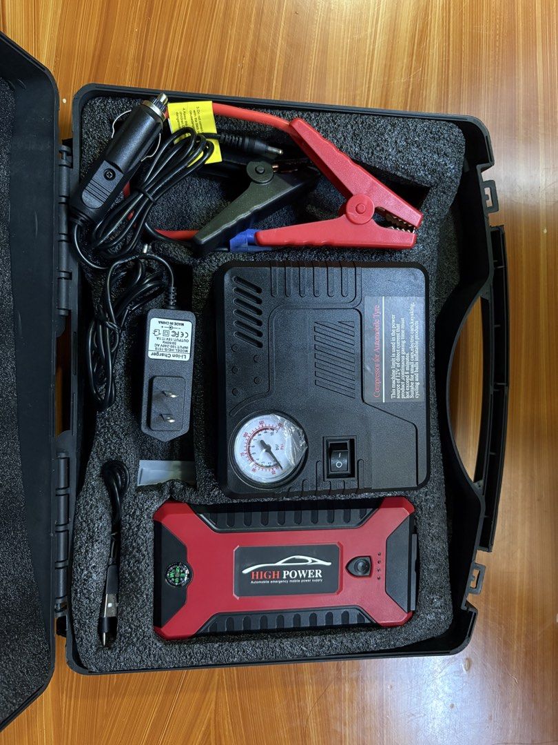 High-Power Multi-Function Car Jump Starter and Air Compressor Kit (Category: Construction Tools & Equipment) located in Batangas. Submitted by luna_gurl (Listing ID 1470142320, Image 2). Description: - Complete emergency kit: Includes portable power bank, tyre air compressor with pressure gauge, and heavy-duty jumper cables - Built-in features: Power bank includes a handy integrated compass for outdoor navigation - All-inclusive accessories: Come