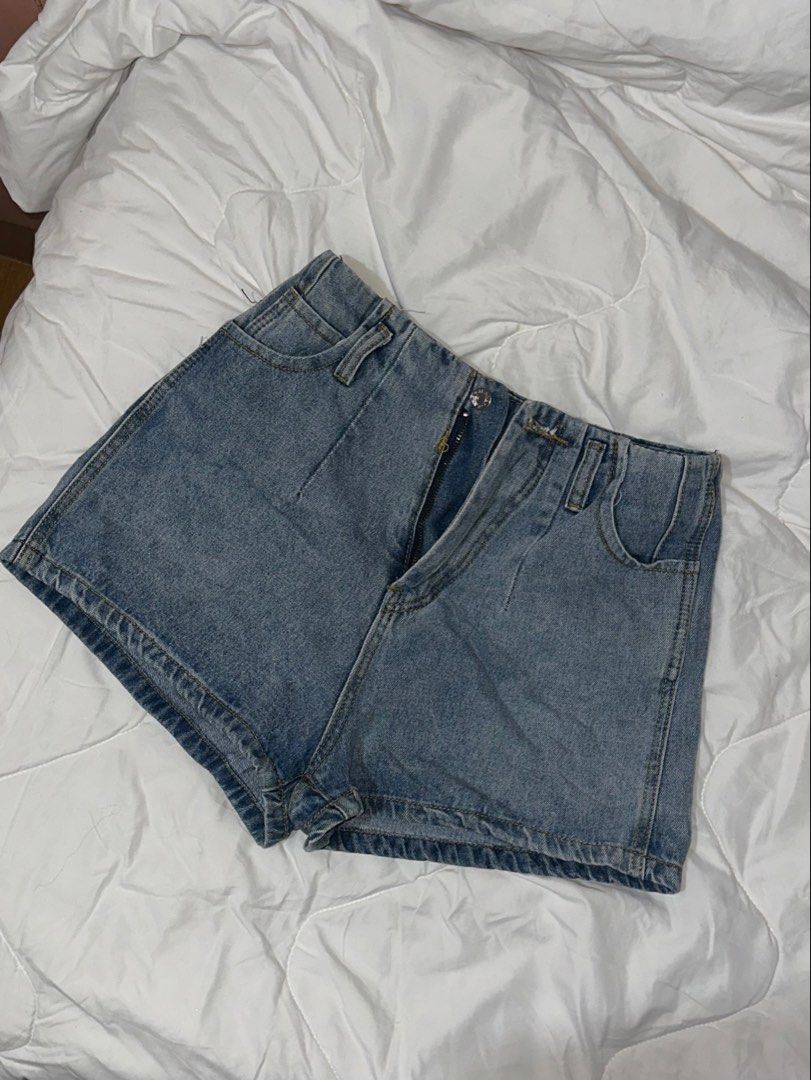 High-waisted blue denim shorts (Category: Shorts) located in Cavite. Submitted by thriftbymari (Listing ID 1470276369, Image 1). Description: waist: 27inches fits small location: cavite.