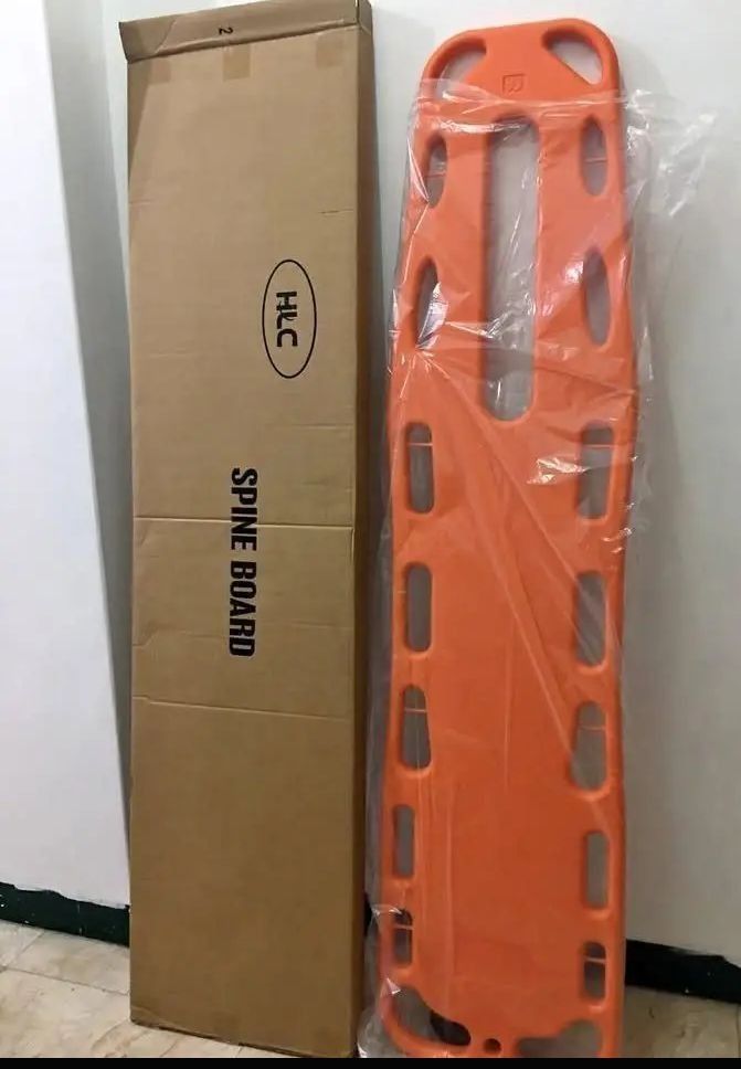 HLC Orange Spine Board Backboard Stretcher with Straps (Category: Medical Supplies & Tools) located in Manila. Submitted by hailidavid_48723a (Listing ID 1470213774, Image 1). Description: - Item: Orange plastic emergency spine board - Condition: Brand new, unused in protective plastic wrapping - Features: Multiple edge handholds, large central slot, and HLC branding - Inclusions: Black patient restraint straps with quick-release buckles and orig