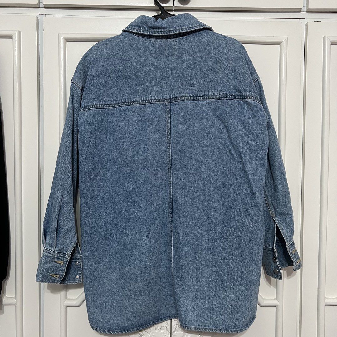 H&M Denim Jacket (Category: Coats, Jackets and Outerwear) located in Las Pinas. Submitted by bangtanbey (Listing ID 1470233029, Image 2). Description: AUTHENTIC H&M (bought at MOA branch) Size on tag: XS (oversized fit) Used once Please check last photo for minor discoloration on one of the buttons.