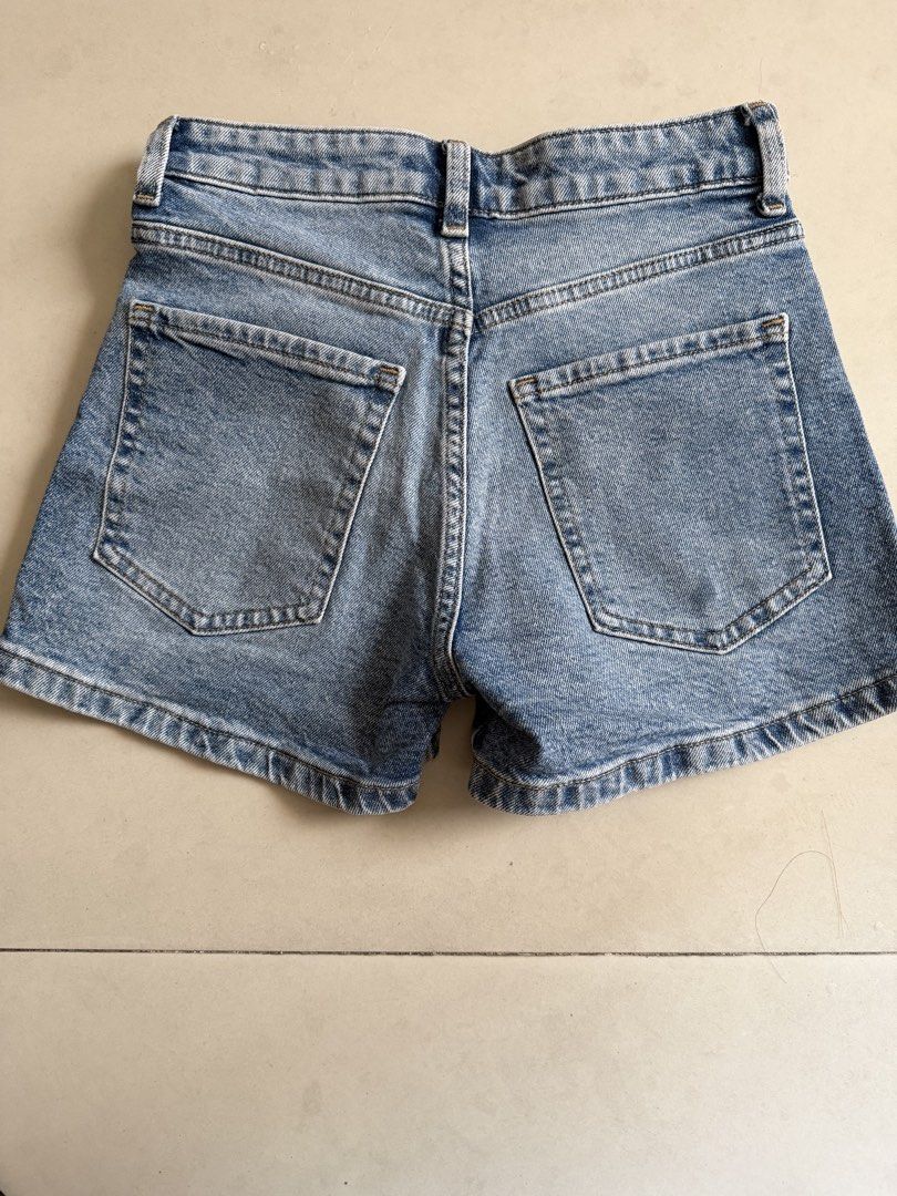 H&M Denim Shorts Light Blue Size 34 (Category: Shorts) located in Paranaque City. Submitted by mryjwll (Listing ID 1470190080, Image 3). Description: - Brand: H&M - Item: Denim shorts - Color: Light blue wash - Size: 34 - Features: Classic five-pocket styling, zip fly, and button closure - Material: Sturdy cotton denim - Condition: Clean and well-maintained - Style: Great basic for casual everyday outfits USED ONCE!.