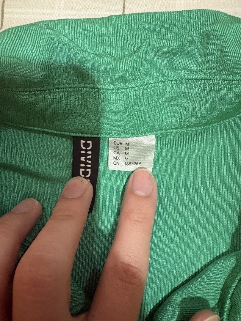 H&M DIVIDED Green Collared Long Sleeve Button-Up Top (Category: Longsleeves) located in Dasmarinas. Submitted by littleczarmer (Listing ID 1470293973, Image 2). Description: - Brand: H&M Divided - Size: M (CN 165/96A) - used once - 3rd pic is reference pic only from ebay, but same product!.