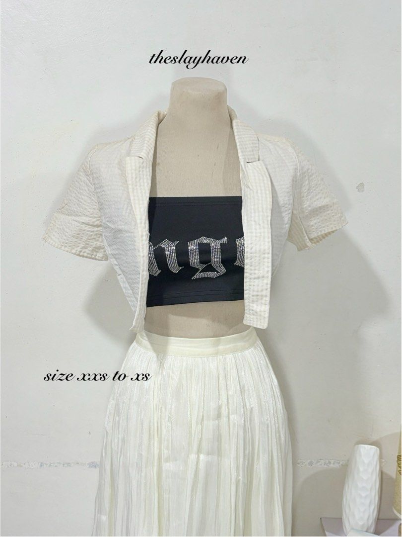 H&M Gingham Crop Blazer Beige White Size XXS (Category: Blouses) located in Manila. Submitted by biacakes (Listing ID 1470260030, Image 1). Description: - Brand: H&M - Style: Cropped blazer / short-sleeve jacket with lapel collar - Pattern: Beige and white checkered gingham - Size: 32 (XXS) - Tag still attached - Material: Lightweight textured fabric - Condition: Brand new with tags (BNWT) - Versatility: Great layering piece for casual and smart-