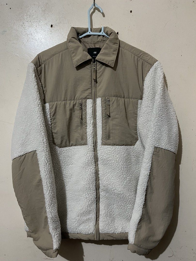 H&M Sherpa Block Jacket Size M (Category: Coats, Jackets and Outerwear) located in Baguio. Submitted by visentovi (Listing ID 1470301883, Image 1). Description: - Brand/Model: H&M Sherpa and Nylon Panel Jacket - Color: Beige and White - Size: Medium (Regular fit) - Design: Warm fleece body with contrast woven overlays - Features: Full zip closure and two secure zippered chest pockets - Condition: Clean, excellent pre-loved condition with minimal 
