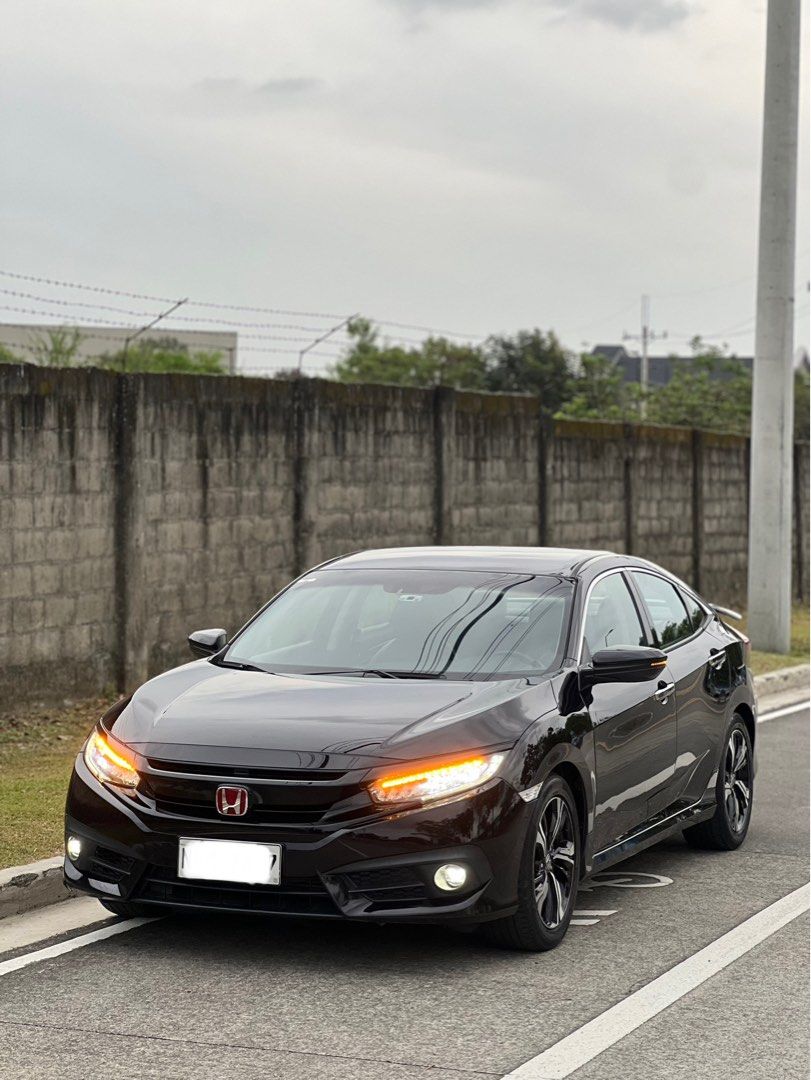 Honda Civic Rs turbo Auto (Category: Used Cars) located in Cavite. Submitted by klarjar (Listing ID 1470253812, Image 2). Description: 2017 honda civic rs turbo Details: 2017 honda civic Rs turbo Automatic transmission 61,xxx (not tampered) Color: Burgundy Gasoline First owner Push start Keyless entry Power Seats Leather seats Touchscreen infotainment Reverse camera Dual-zone climate control Complete original papers No history of any accident Not