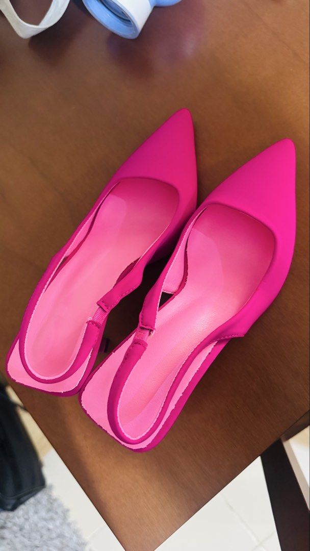 Hot Pink Slingback Heels Pointed Toe Size 37 (Category: Heels) located in Caloocan City. Submitted by burnsvl (Listing ID 1470297248, Image 1). Description: - Color: Vibrant hot pink - Size: 37 - Style: Slip-on slingback with pointed toes - Heel: Low flared block heel with a glossy finish - Condition: Clean insoles and bright pink interior lining - Perfect for work, parties, or casual chic looks.