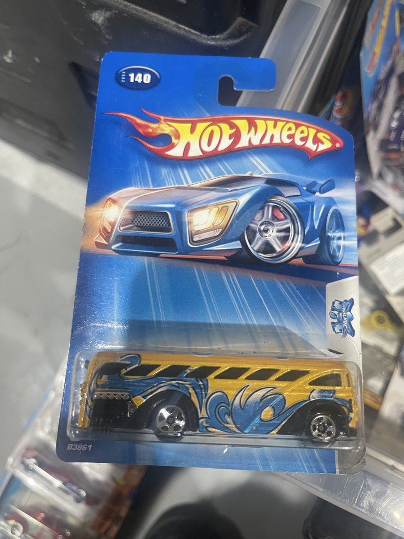 Hot Wheels 2004 Collector No. 140 Yellow Bus (Category: Vehicle & Diecast Models) located in Marikina City. Submitted by starlettonabudget (Listing ID 1470263921, Image 1). Description: - Brand: Hot Wheels (2004 Series, No. 140) - Model: Yellow Bus with blue and white wave graphics - Details: Black chassis, chrome wheels - Packaging: Original blue blister pack with classic flame logo - Model Code: B3861 (lower left corner) - Condition: Brand new 