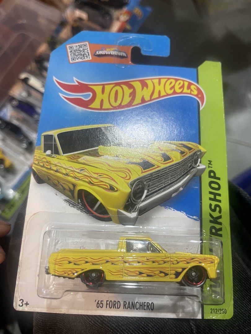 Hot Wheels '65 Ford Ranchero Yellow Flame Design (Category: Vehicle & Diecast Models) located in Marikina City. Submitted by starlettonabudget (Listing ID 1470246786, Image 1). Description: - Brand: Hot Wheels - Model: '65 Ford Ranchero (Workshop Edition) - Series Number: 212 out of 250 - Design: Bright yellow body with striking red and black flame graphics - Wheels: Stylish red-rimmed wheels - Condition: Brand new, still sealed in original blist
