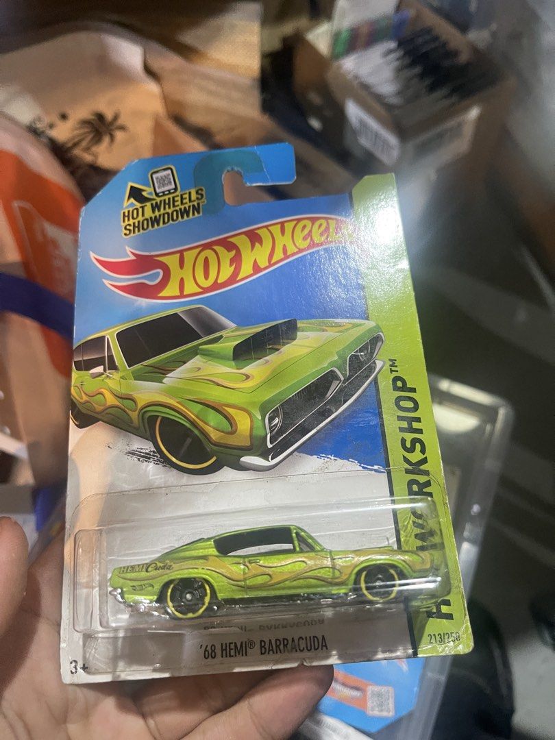 Hot Wheels HW Workshop '68 Hemi Barracuda (Category: Vehicle & Diecast Models) located in Marikina City. Submitted by starlettonabudget (Listing ID 1470251383, Image 1). Description: - Model: '68 Hemi Barracuda (HW Workshop Series) - Number: 213 out of 250 - Color/Design: Green body with yellow and gold flames - Condition: Brand new, unopened packaging with mint card - Perfect for collectors and enthusiasts.
