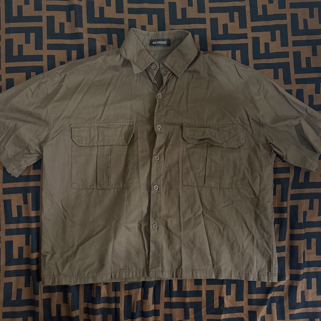 HUILISHI / Mannered Boxy Polo (Category: Tshirts & Polo Shirts ) located in Cainta. Submitted by amswardrobe (Listing ID 1470192033, Image 3). Description: - Brand: Mannered - Design: Cropped/Boxy - Size: Large - Style: Short sleeve button-up with standard collar and front pocket - Condition: Clean, excellent, and ready to wear Colors: White, Black, Army Green and Khaki 180 each 1K take all (6pcs).