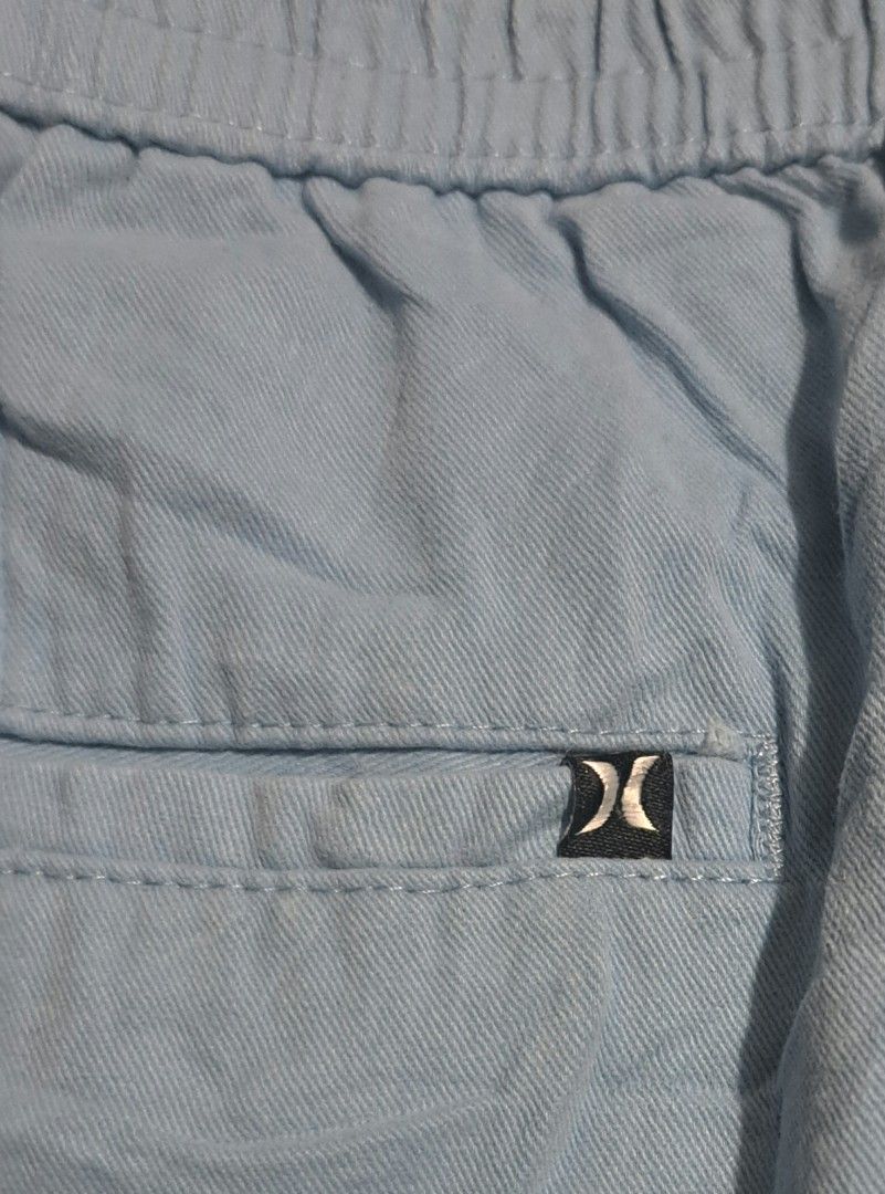 Hurley Light Blue Drawstring Shorts Size L (Category: Shorts) located in San Fernando, Camarines Sur. Submitted by ladderaya (Listing ID 1470240927, Image 3). Description: - Brand: Hurley - Size: Large - Color: Light Blue - Waistband: Elastic with adjustable drawstring - Pockets: Two side pockets and one back pocket with logo patch - Condition: Great for summer, beach trips, and casual lounging.