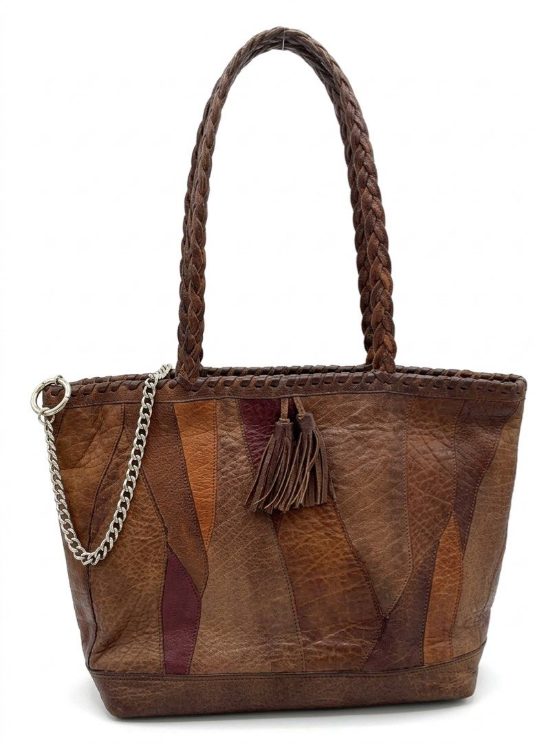Ibiza Leather Patchwork Shoulder Bag with Tassel (Category: Shoulder Bags) located in Taguig. Submitted by rainhugo (Listing ID 1470184571, Image 1). Description: Authentic Handcrafted IBIZA Japan Patchwork Leather Tote Bag Up for sale is a beautiful, premium handcrafted patchwork leather tote bag from the renowned Japanese luxury brand, IBIZA. This bag features high-quality genuine pebbled leather panels in stunning earth tones (browns, tan, and