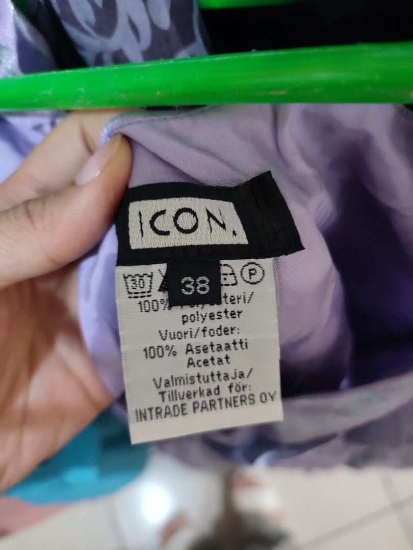 ICON Purple Bubble Dress (Category: Dresses) located in Jaen. Submitted by roxantiago (Listing ID 1470326546, Image 2). Description: - Brand: ICON (by Intrade Partners Oy) - Size: 38 (Medium) - Color: Vibrant Purple - Material: 100% polyester with 100% acetate lining - Design: Pleated bodice, gathered puffy straps, and a playful bubble hem - Length: Mid-length skirt - Care: Washable at 30 degrees - Occasion: Perfect for parties, events, and night
