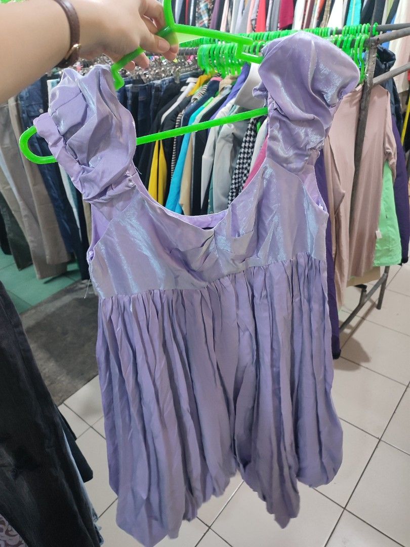 ICON Purple Bubble Dress (Category: Dresses) located in Jaen. Submitted by roxantiago (Listing ID 1470326546, Image 1). Description: - Brand: ICON (by Intrade Partners Oy) - Size: 38 (Medium) - Color: Vibrant Purple - Material: 100% polyester with 100% acetate lining - Design: Pleated bodice, gathered puffy straps, and a playful bubble hem - Length: Mid-length skirt - Care: Washable at 30 degrees - Occasion: Perfect for parties, events, and night