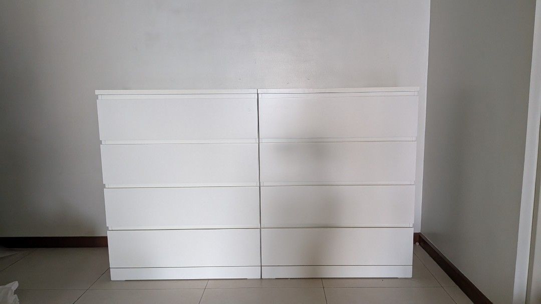 IKEA MALM White 4-Drawer Chest (80x100 cm) (Category: Shelves, Cabinets & Racks) located in Makati City. Submitted by cedr012345 (Listing ID 1470287833, Image 1). Description: - Photo shows 2 MALM 4-drawers, only 1 MALM drawer is left - 4 wide drawers total for massive storage space Size: 80x100cm - Clean, handleless minimalist design - Smooth matte white finish - Sturdy build, sits flat and stable - Perfect for bedroom clothes and organization -