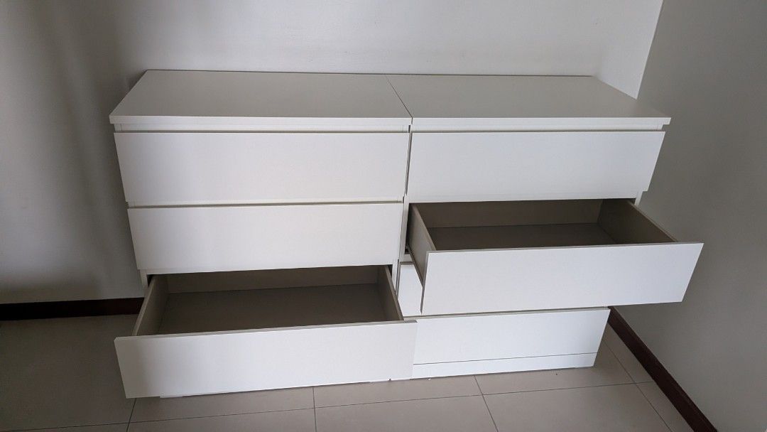 IKEA MALM White 4-Drawer Chest (80x100 cm) (Category: Shelves, Cabinets & Racks) located in Makati City. Submitted by cedr012345 (Listing ID 1470287833, Image 2). Description: - Photo shows 2 MALM 4-drawers, only 1 MALM drawer is left - 4 wide drawers total for massive storage space Size: 80x100cm - Clean, handleless minimalist design - Smooth matte white finish - Sturdy build, sits flat and stable - Perfect for bedroom clothes and organization -