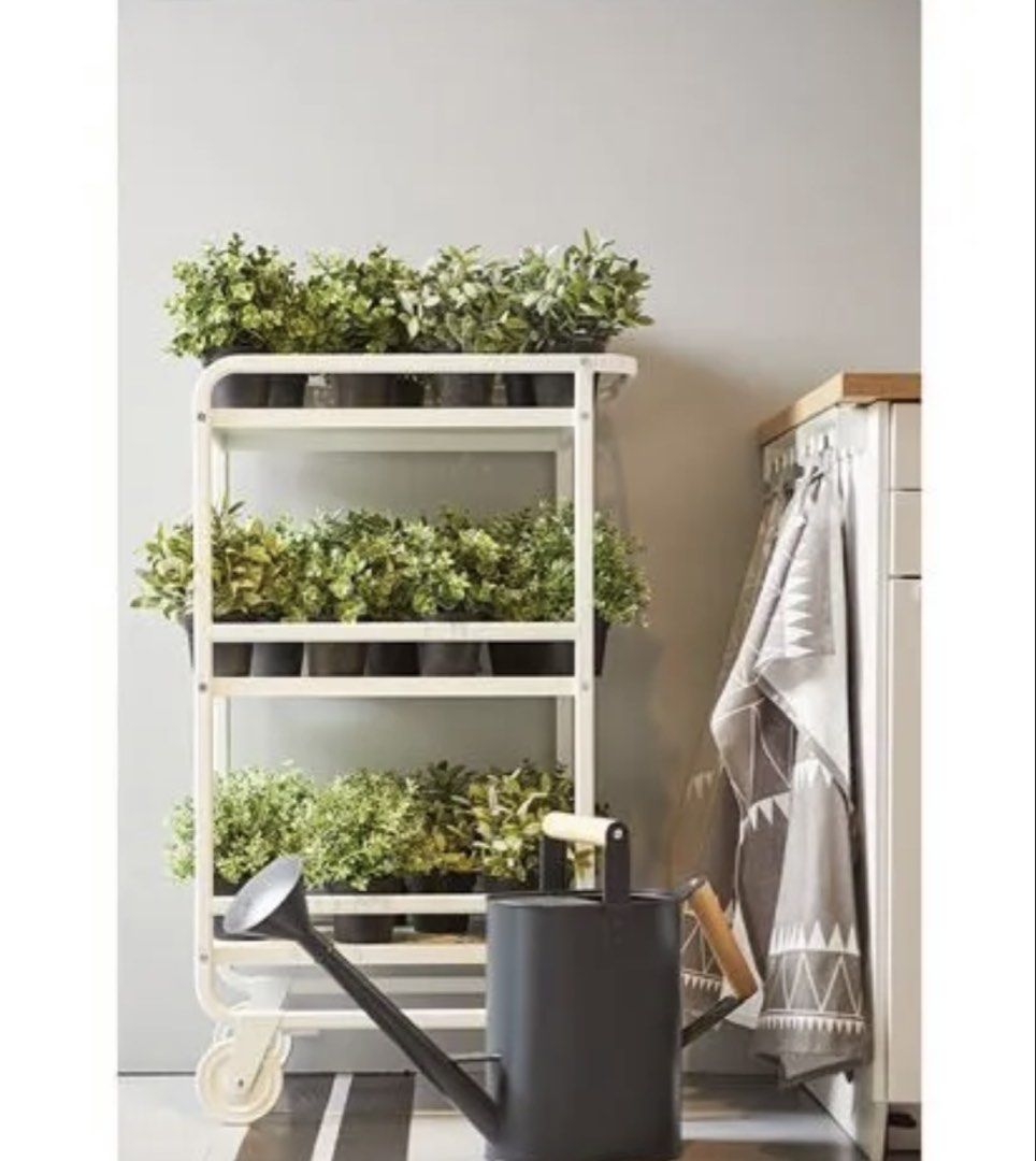 IKEA SUNNERSTA Trolley/ Utility White Cart (Category: Shelves, Cabinets & Racks) located in Angeles City. Submitted by holyfabclothing (Listing ID 1470225006, Image 3). Description: - 3-tier white metal utility cart for instant extra storage - Slim rolling design fits narrow spaces like kitchens and bathrooms - Equipped with two front wheels and back legs for stability - Raised shelf edges prevent items from falling off - Clean, modern look that 