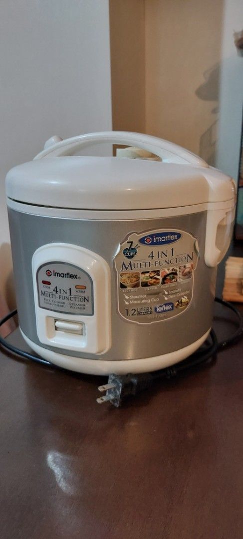 Imarflex 4-in-1 Multi-Function Rice Cooker 1.2 Liters (Category: Cookers) located in Antipolo. Submitted by kdens21 (Listing ID 1470299210, Image 1). Description: - Brand: Imarflex - Capacity: 1.2 Liters (up to 7 cups) - Color: Grey and White exterior - Multi-function: Rice cooker, warmer, steamer, and shabu-shabu - Pot: Non-stick inner pot with cup and liter measurement markings - Inclusions: Detachable power cord - Condition: Clean interior and