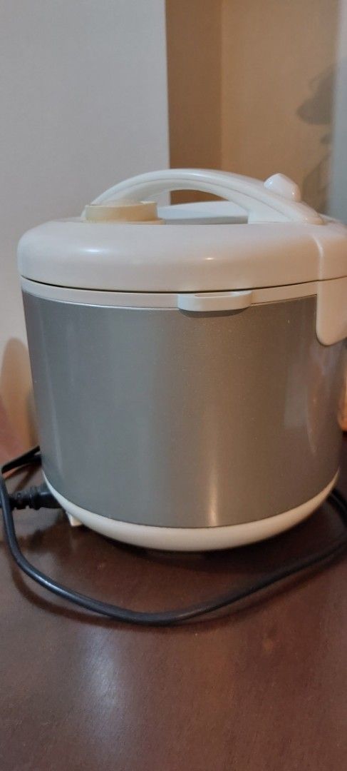 Imarflex 4-in-1 Multi-Function Rice Cooker 1.2 Liters (Category: Cookers) located in Antipolo. Submitted by kdens21 (Listing ID 1470299210, Image 3). Description: - Brand: Imarflex - Capacity: 1.2 Liters (up to 7 cups) - Color: Grey and White exterior - Multi-function: Rice cooker, warmer, steamer, and shabu-shabu - Pot: Non-stick inner pot with cup and liter measurement markings - Inclusions: Detachable power cord - Condition: Clean interior and