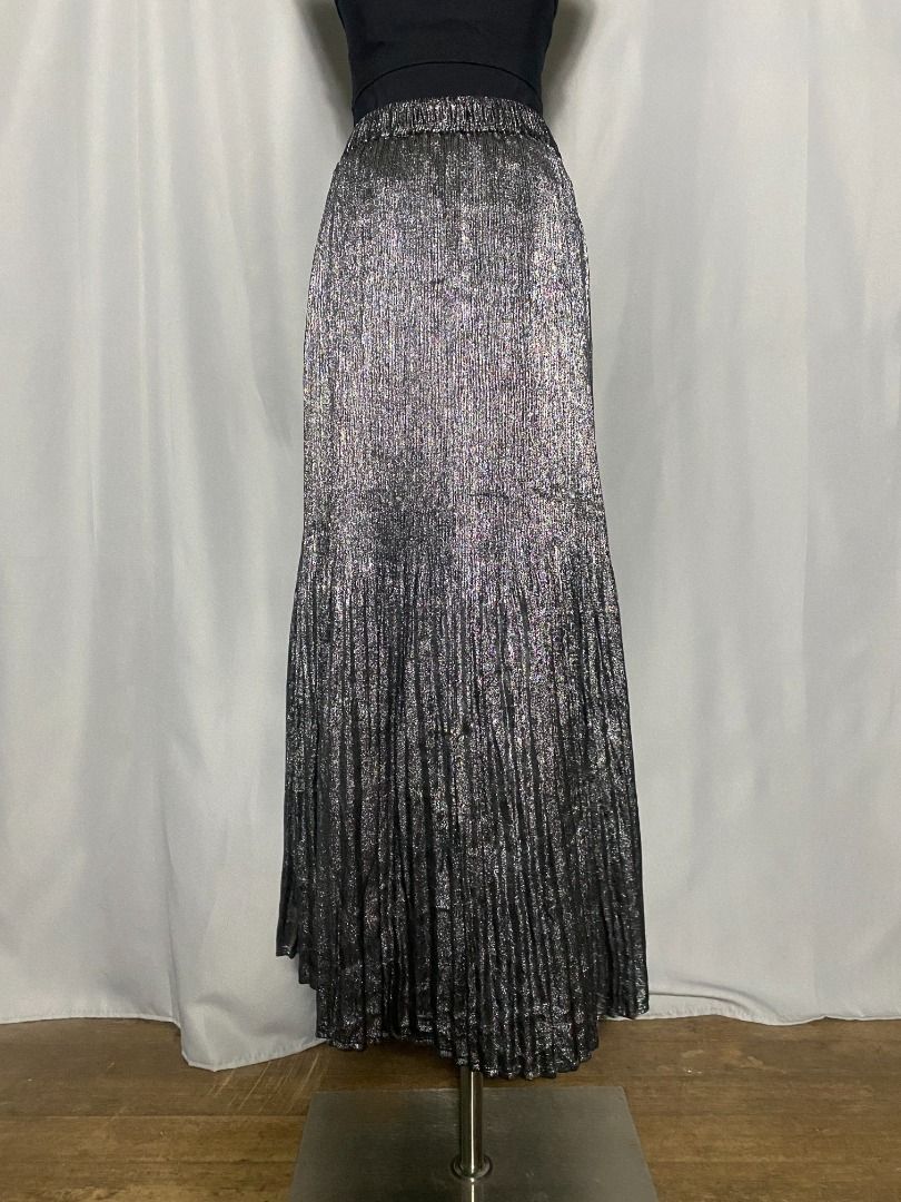 Initial metallic pleated skirt (Category: Skirts) located in Las Pinas. Submitted by ipickyou (Listing ID 1470291926, Image 3). Description: Unwashed Condition: 10/10 𝗠𝗲𝗮𝘀𝘂𝗿𝗲𝗺𝗲𝗻𝘁𝘀 𝘄𝗵𝗲𝗻 𝗹𝗮𝗶𝗱 𝗳𝗹𝗮𝘁: -Size 2 -Waist: 12-18” -Length: 35” .
