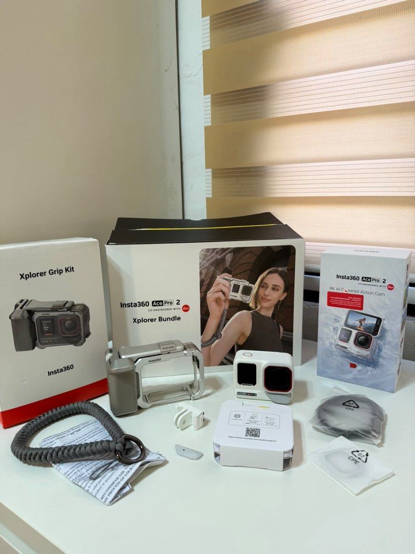Insta360 Ace Pro 2 (Category: Video Cameras) located in Manila. Submitted by jstspotsk (Listing ID 1470223337, Image 1). Description: - Insta360 Ace Pro 2 action camera bundle in pristine condition - Includes main Xplorer Bundle box and Xplorer Grip Kit box - Comes with Tilta metal cage, grip handle, lanyard, and complete mounting hardware - 100% complete with all original packaging and components as pictured - Perfect for vloggers and adventure 