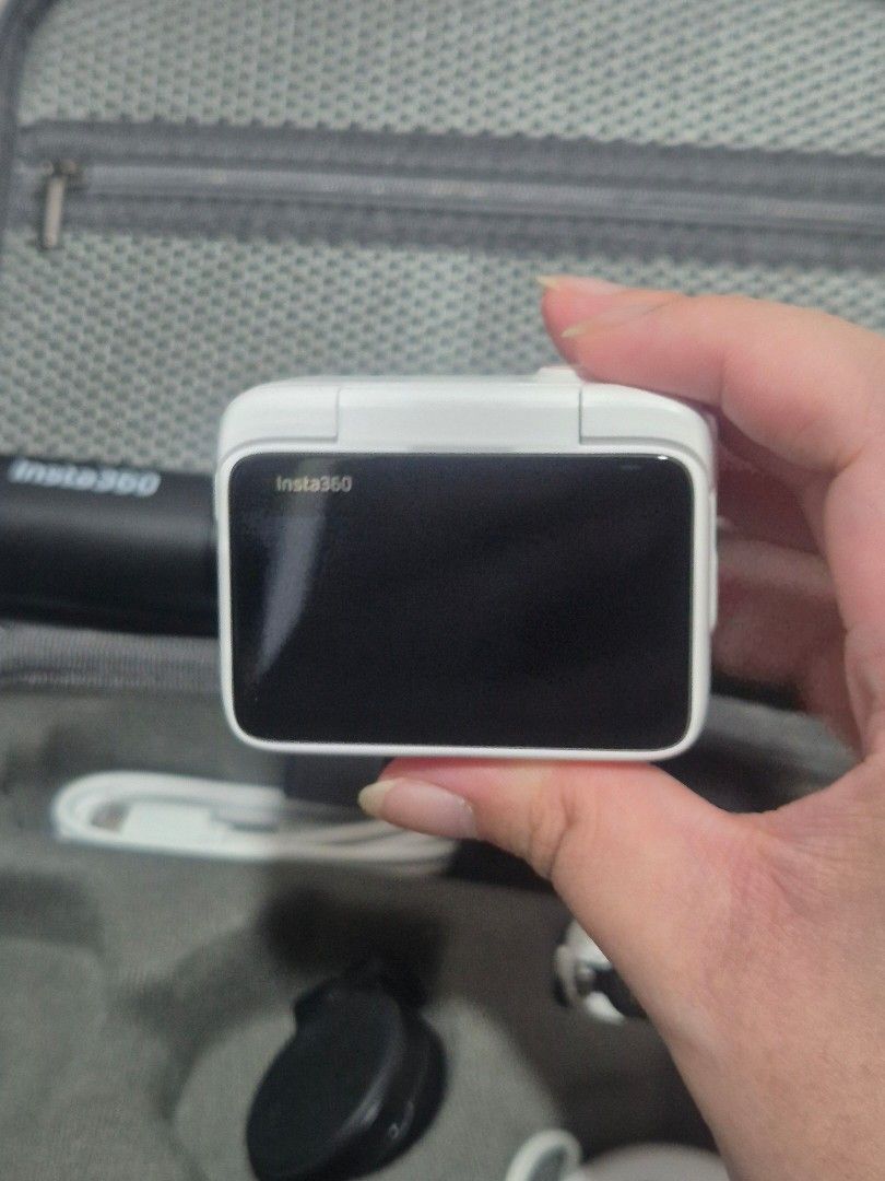 Insta360 GO 3S Action Camera Bundle with Case (Category: Video Cameras) located in Cainta. Submitted by jamdgu (Listing ID 1470195377, Image 3). Description: Insta360 GO 3S tiny 4K action camera with screen protector - Includes Action Pod, mini tripod/ selfie stick, lens guard, magnetic pendant, pivot stand, easy clip, charging cable, battery pack, quick reader and memory card - Comes with storage case Condition: like new, with complete boxes RFS