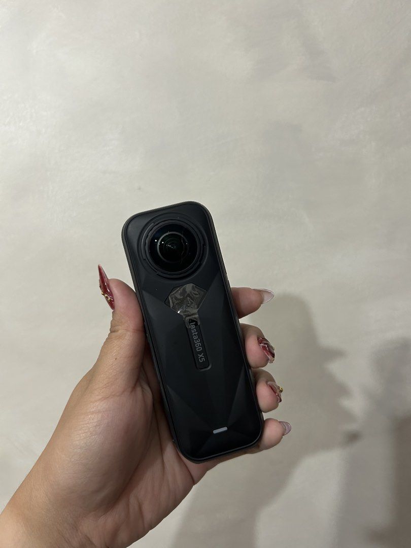 Insta360 X5 8K 360 Action Cam with Stick (Category: Cameras) located in Meycauayan. Submitted by isabellesbstn (Listing ID 1470225209, Image 2). Description: -Insta 360 X5 used for a few times but still good as new, bought last May 2026. -Free selfie stick insta 360. - Factory protective sticker still attached to the rear body - Ideal setup for immersive vlogging and travel videography Rfs: upgrade Price slightly nego. .