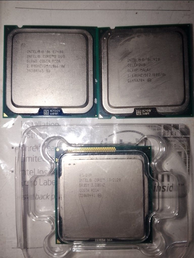 Intel Processors and DDR2/DDR3 RAM Sticks (Category: Desktops) located in Cavite. Submitted by emilgarcia09 (Listing ID 1470282685, Image 2). Description: Bundle includes three desktop processors: Intel Core 2 Duo E7400, Intel Celeron 420, and Intel Core i3-2120. Also includes four desktop RAM modules consisting of one 1GB I-O DATA DDR3, one 4GB Kingston DDR3, and two 1GB Elpida PC2-6400U DDR2 sticks. Pulled from working systems previously. Good 