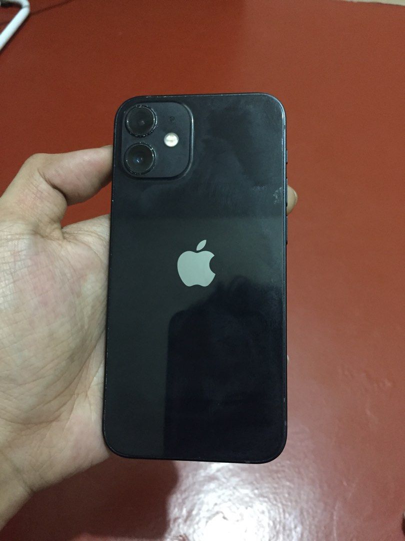 iPhone 12 mini (Category: iPhone 12 Series) located in Manila. Submitted by bright_angelocandelaria (Listing ID 1470333403, Image 2). Description: Selling my iPhone 12 mini, 256GB, purchased from iGadgets in September 2025 for ₱15K+ ✨ DETAILS: ✅ 256GB Storage ✅ Face ID working ✅ With box and Case + Charger. ✅ Compact and handy ✅ No functional issues noticed during use, aside from the disclosed conditions 📌 HONEST DISCLOSURE: • Small crack on the