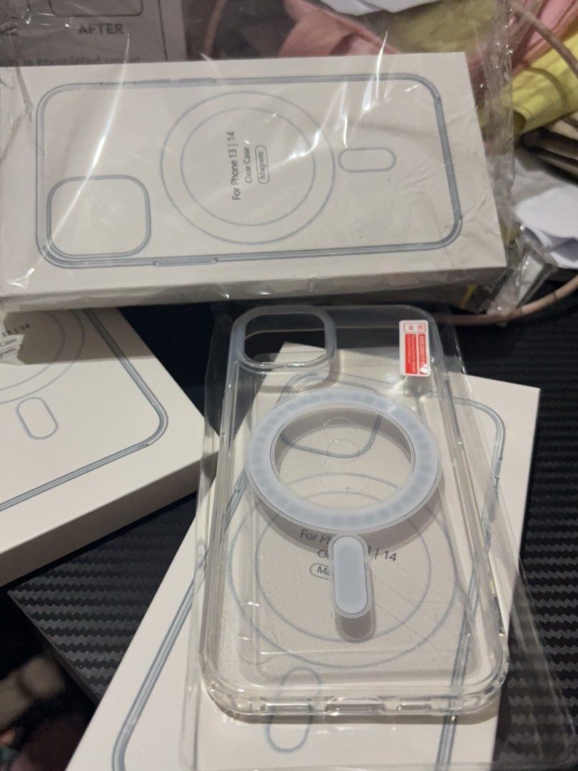 Iphone 13 14 acrylic case magsafe (Category: Cases & Sleeves) located in Manila. Submitted by royalpengwen (Listing ID 1470307104, Image 3). Description: - Compatible with: iPhone 13 and iPhone 14 - Material: High-quality clear acrylic with built-in MagSafe - Condition: Brand new in original packaging - Design: Transparent slim fit to showcase your phone's original look - Delivery: Shipping via J&T and Shopee - Meetup locations: Mercury Drug Sum-