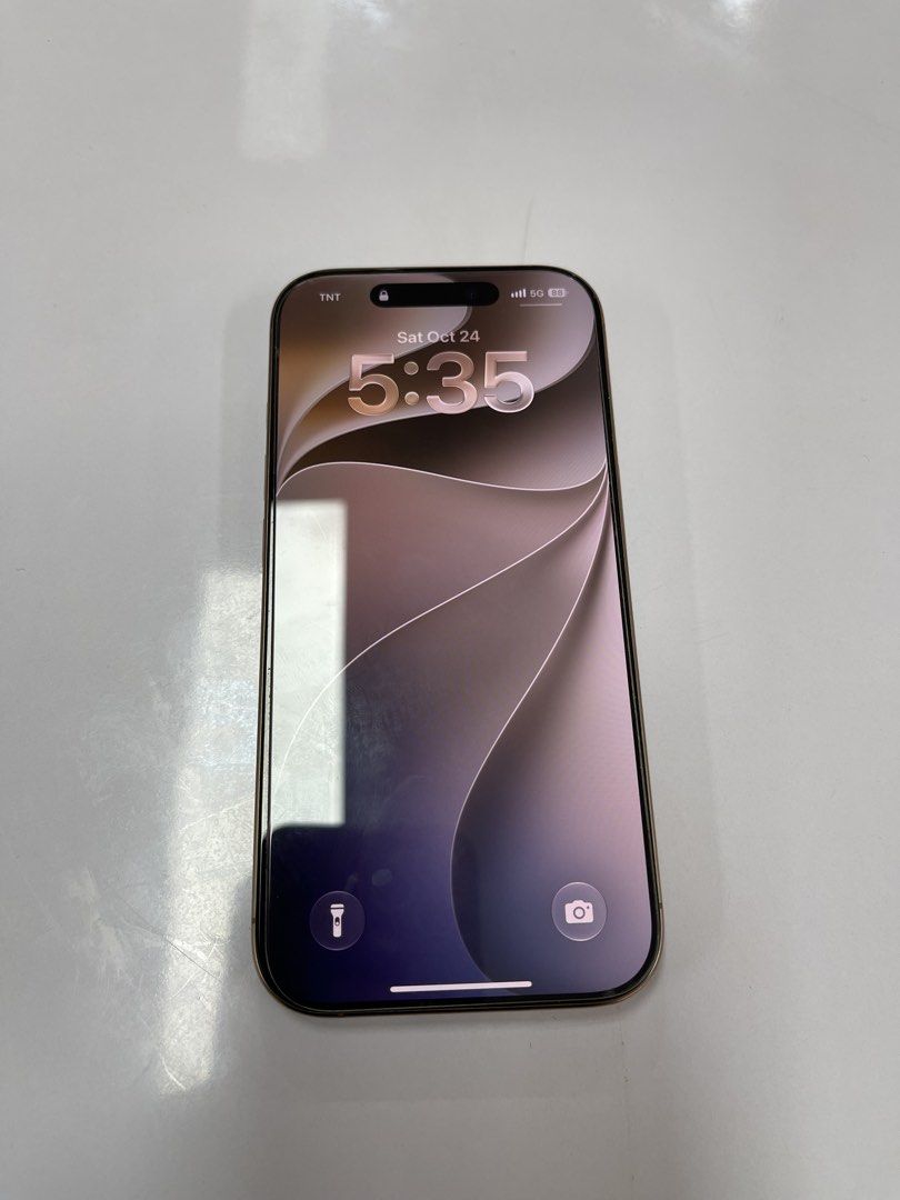 Iphone 16 Pro Desert Titanium (Category: iPhone 16 Series) located in Manila. Submitted by sav.whotf (Listing ID 1470197276, Image 2). Description: IPHONE 16 PRO 128GB DESERT TITANIUM 92% BH | 695 CC SMART LOCKED - local ntc variant ₱35k only no history of repair unit & case only ONLY issue: dents sa side and paligid ng isang cam (see pics).