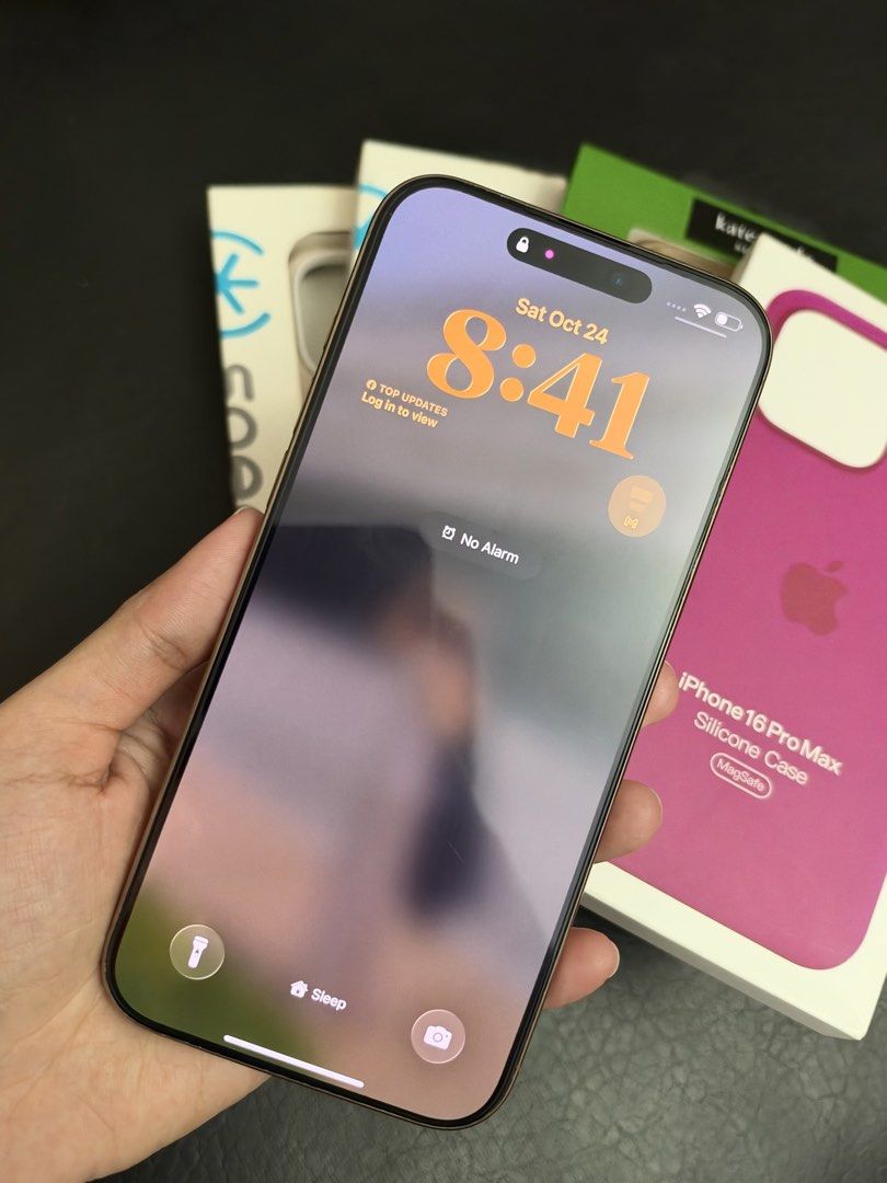 iPhone 16 Pro Max I 256GB (Category: iPhone 16 Series) located in Quezon City. Submitted by czarinaella (Listing ID 1470147418, Image 1). Description: For Sale Only iPhone 16 Pro Max I 256GB Desert Titanium Smart-Locked 82% Battery Heath No Dents; Good as new Complete inclusions: box, original cord and cases Price at 43,000 slightly negotiable RFS: Upgraded Meet up around QC and Pasig.