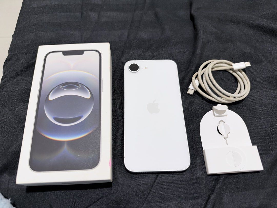 Iphone 16e 128gb White (Category: iPhone 16 Series) located in Manila. Submitted by from_elle (Listing ID 1470329088, Image 1). Description: No repair history (all original parts) No scratches No issues No SIM restrictions Unli reset All working (true tone/face id) With box, charger cord & simcard ejector pin 1 year and 2 months old 91% Battery Health 512 Cycle count 128gb Manufacture Date: February 2025 First Use: August 2025 Lady owned RFS: Upg