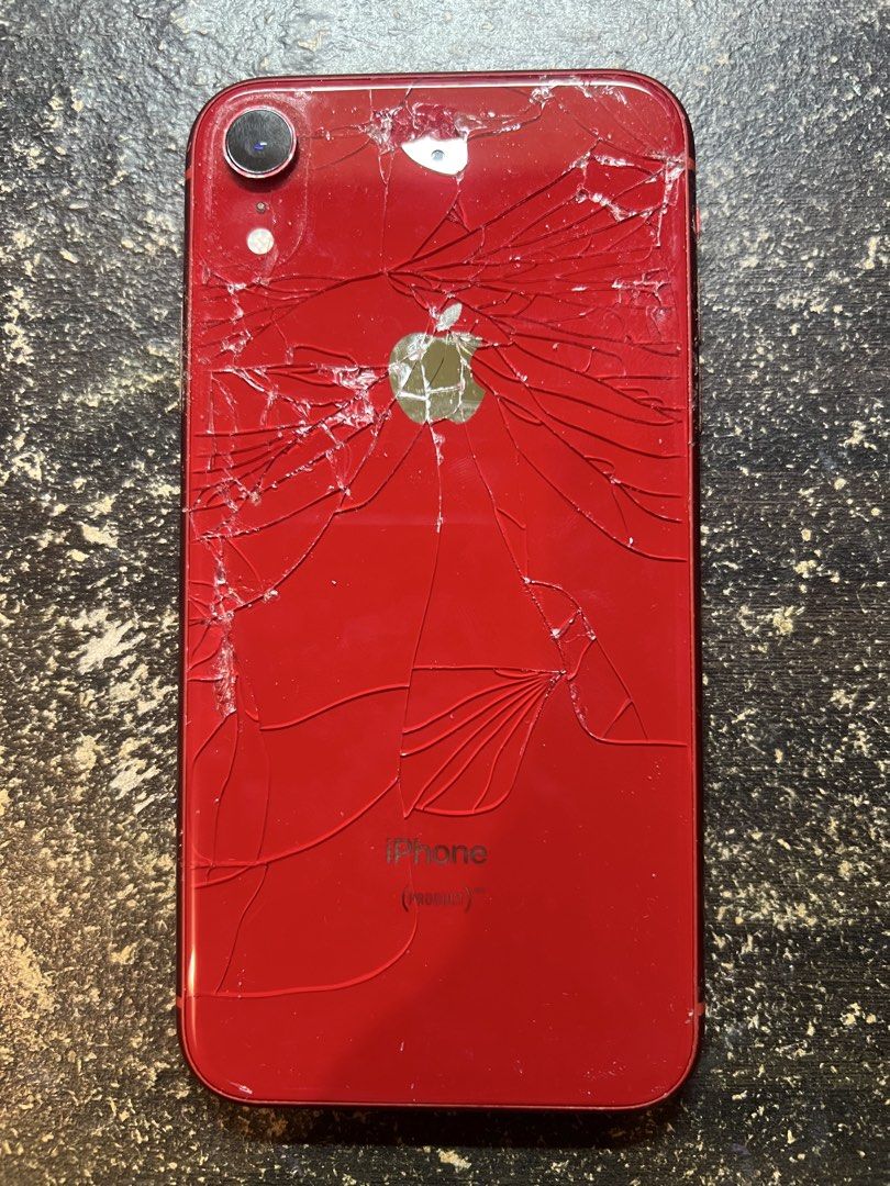 Iphone XR Red PHYSICALLY DAMAGED/CRACKED (Category: iPhone X Series) located in Cainta. Submitted by chantalloyola (Listing ID 1470284371, Image 1). Description: Iphone XR 128GB Red - with box (no earphones or charging cord) - FREEBIES: original Apple USB adaptor, and 1 phone case - HEAVILY DAMAGED/SHATTERED BACK GLASS. - Front Screen is clean but with LCD issues (see through like dots visible on white screen. not visible if di naman white screen