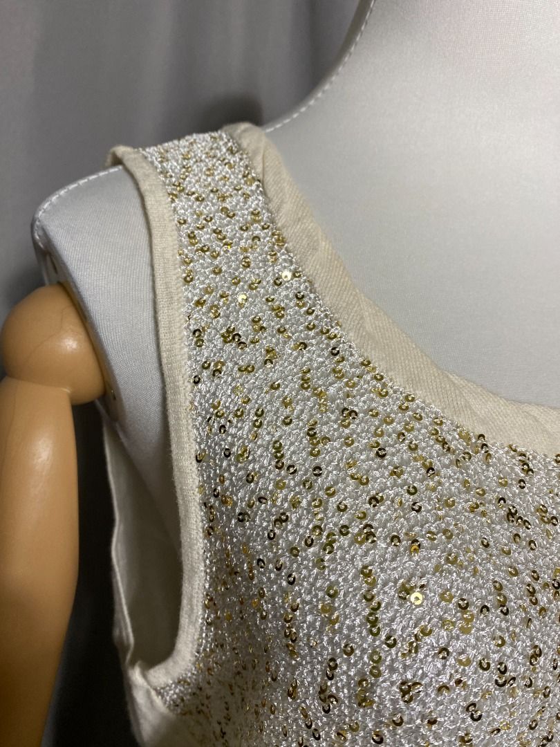 Jacklyn & Smith cream gold sequined sleeveless top (Category: Sleeveless) located in Las Pinas. Submitted by ipickyou (Listing ID 1470289227, Image 3). Description: Unwashed Condition: 10/10 𝗠𝗲𝗮𝘀𝘂𝗿𝗲𝗺𝗲𝗻𝘁𝘀 𝘄𝗵𝗲𝗻 𝗹𝗮𝗶𝗱 𝗳𝗹𝗮𝘁: -Size L -Armpit to armpit: 19” -Length: 23 1/2” .