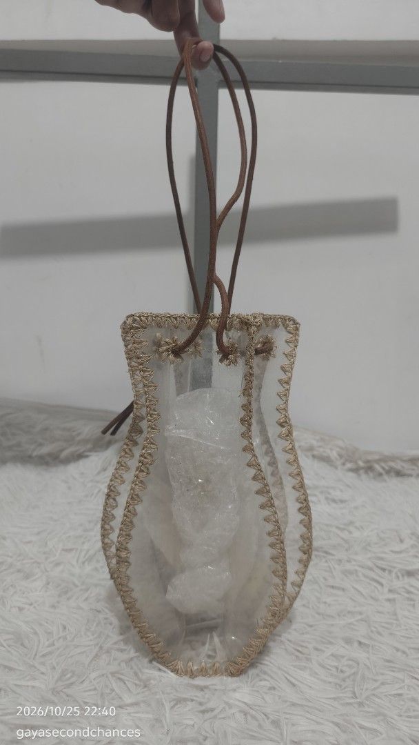 JAMIRAY POT PATCHWORK TRANSPARENT BAG (Category: Tote Bags) located in Kalibo. Submitted by secondchances.thriftsh8p (Listing ID 1470313361, Image 1). Description: - Brand/Model: JAMIRAY pot patchwork bag - Material: Clear vinyl with beige crochet trim and brown leather accents - Closure & Straps: Secure leather drawstring and slender shoulder straps - Design: Unique vase-shaped bucket bag with a small logo tag - Best For: Casual outings, beach t