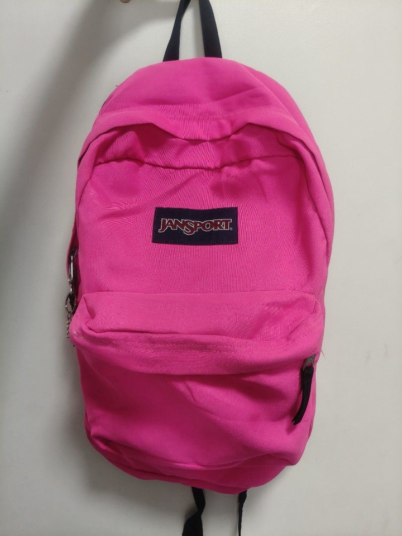 JanSport Pink Backpack (Category: Backpacks) located in San Fernando. Submitted by pollygirl08 (Listing ID 1470172255, Image 1). Description: - Authentic bright pink JanSport backpack - Front zippered pocket for extra storage and organization - Classic everyday design, perfect for school, commute, or travel - Made with durable fabric built to last - Overall clean condition with smooth, working zippers.