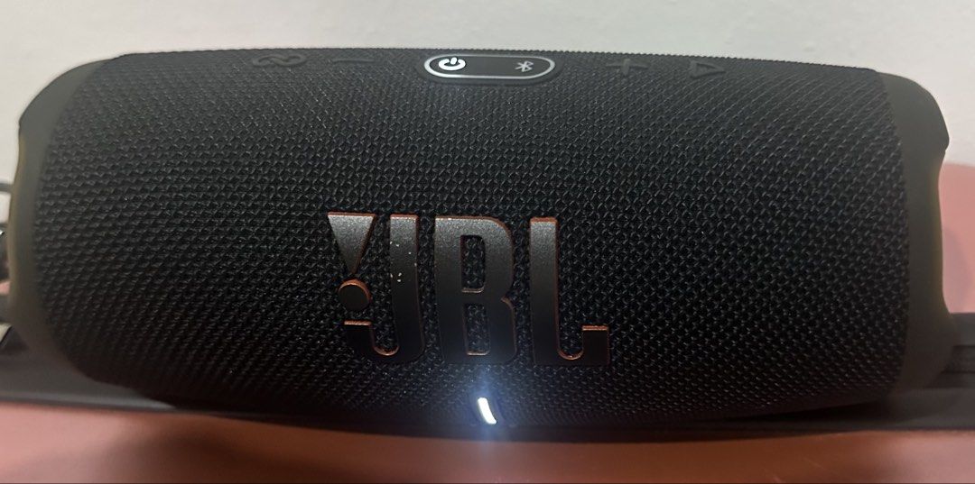 JBL Charge 5 Portable Bluetooth Speaker Black (Category: Soundbars, Speakers & Amplifiers) located in Mandaluyong City. Submitted by skol.le (Listing ID 1470325410, Image 3). Description: - Brand: JBL - Color: Black portable wireless speaker with bold front signature logo - Sound Quality: Delivers strong bass and clear audio for outdoor gatherings, parties, and everyday listening - Controls & Ports: Convenient top-panel power and bluetooth button