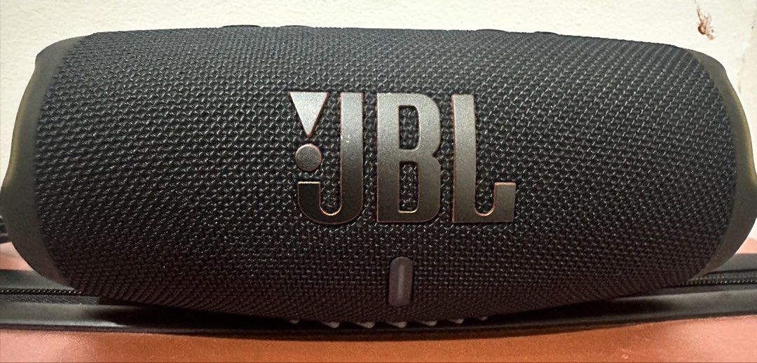 JBL Charge 5 Portable Bluetooth Speaker Black (Category: Soundbars, Speakers & Amplifiers) located in Mandaluyong City. Submitted by skol.le (Listing ID 1470325410, Image 1). Description: - Brand: JBL - Color: Black portable wireless speaker with bold front signature logo - Sound Quality: Delivers strong bass and clear audio for outdoor gatherings, parties, and everyday listening - Controls & Ports: Convenient top-panel power and bluetooth button