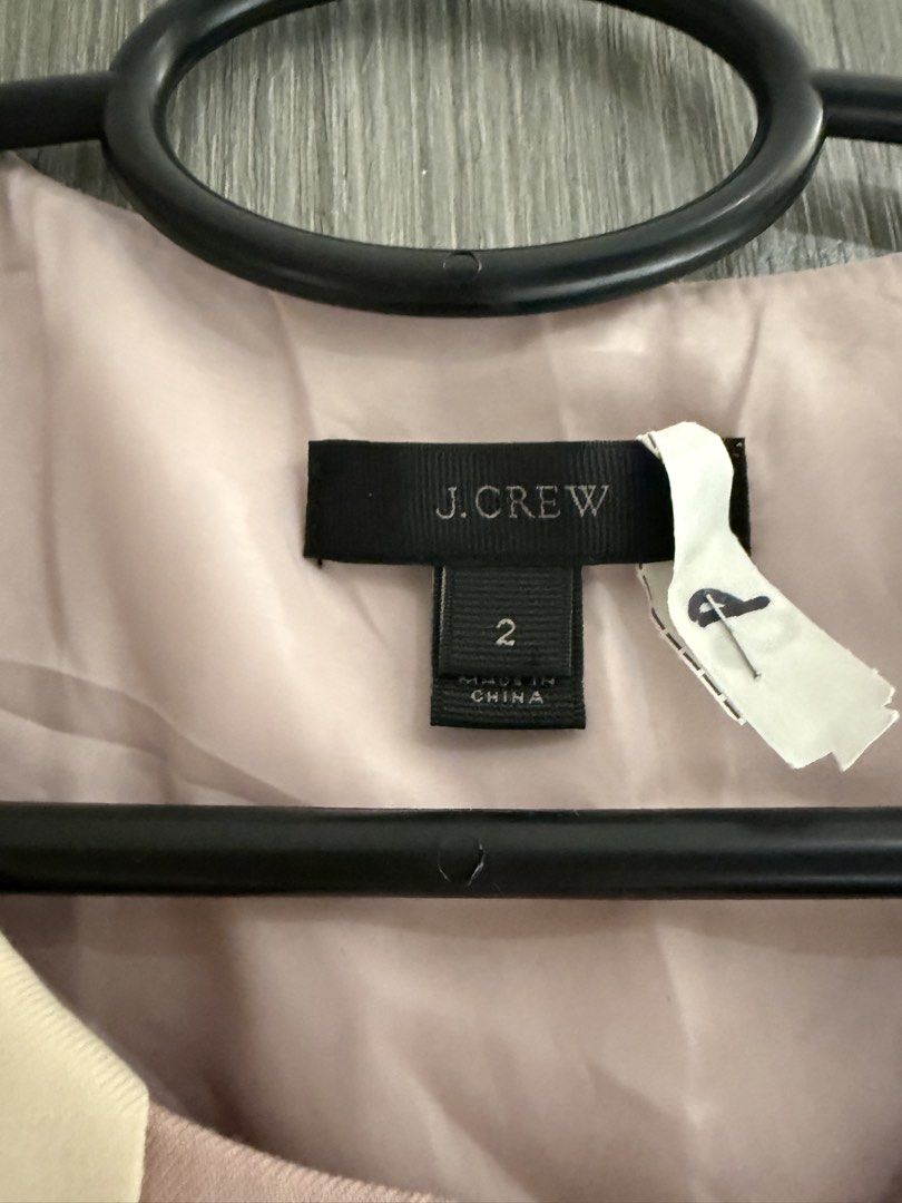 j.crew Pink Wool Dress (Category: Dresses) located in Quezon City. Submitted by adc2011 (Listing ID 1470230973, Image 2). Description: - Brand: Vintage J.Crew - 100% wool - Sells at around 2k-3k in Ebay and other shops - Size: 2 (tag attached) - Material: Premium wool exterior, 100% polyester full lining - Color: Pink with contrast cream trim - Design: Sleeveless, asymmetrical front opening, structured waist seams - Pockets: Two functional front 