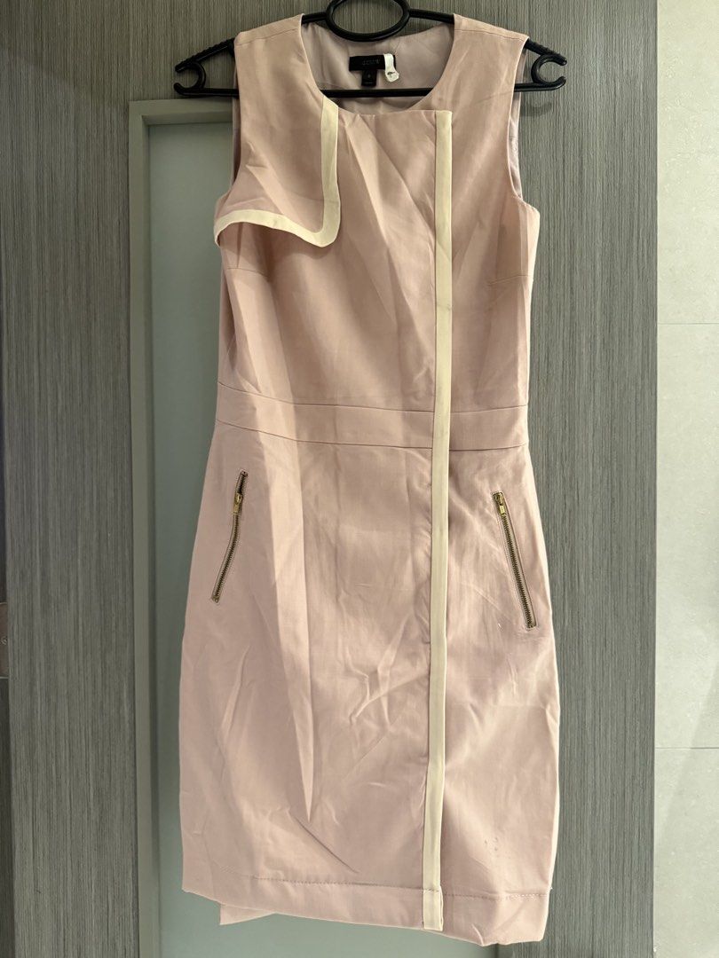 j.crew Pink Wool Dress (Category: Dresses) located in Quezon City. Submitted by adc2011 (Listing ID 1470230973, Image 1). Description: - Brand: Vintage J.Crew - 100% wool - Sells at around 2k-3k in Ebay and other shops - Size: 2 (tag attached) - Material: Premium wool exterior, 100% polyester full lining - Color: Pink with contrast cream trim - Design: Sleeveless, asymmetrical front opening, structured waist seams - Pockets: Two functional front 