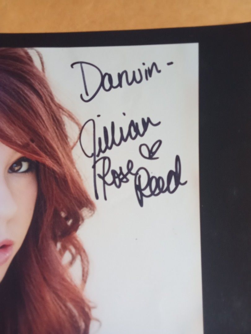 Jillian Rose Reed Signed Autograph Photo (Category: Art & Prints) located in Pasig City. Submitted by teebeedeee (Listing ID 1470185776, Image 2). Description: - Authentic signed portrait of actress Jillian Rose Reed - Personally inscribed to "Darwin" in black marker next to her face - Printed on high-quality heavy cardstock with a stylish black border - Comes with the original US Postal Service mailing envelope siz - Envelope features a Studio C