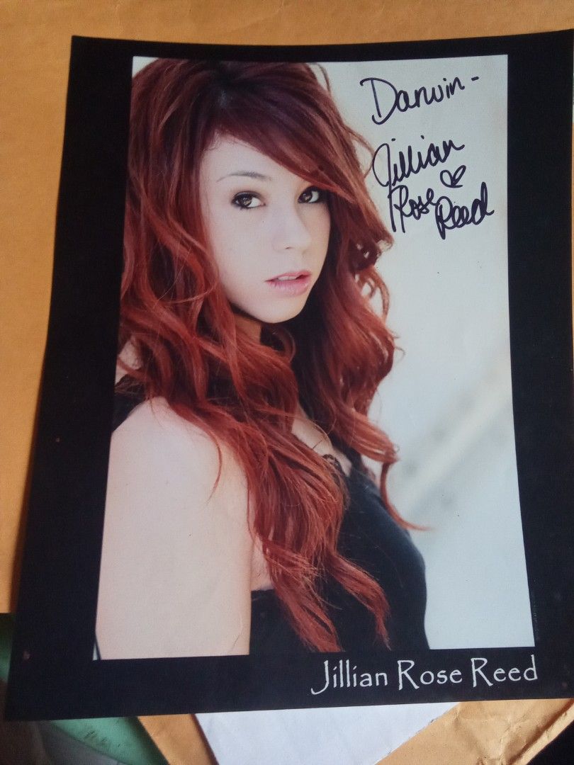 Jillian Rose Reed Signed Autograph Photo (Category: Art & Prints) located in Pasig City. Submitted by teebeedeee (Listing ID 1470185776, Image 1). Description: - Authentic signed portrait of actress Jillian Rose Reed - Personally inscribed to "Darwin" in black marker next to her face - Printed on high-quality heavy cardstock with a stylish black border - Comes with the original US Postal Service mailing envelope siz - Envelope features a Studio C