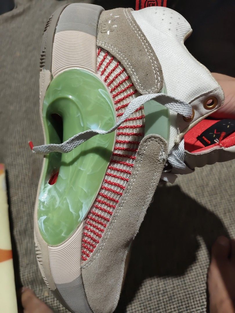 Jordan XXXV CLOT size 10US (Category: Sneakers) located in Taguig. Submitted by korilakkumachan (Listing ID 1470327110, Image 3). Description: - Model: Jordan XXXV - Colorway: Tan and red with green marble-patterned midfoot shank plate and gold embroidered Jumpman logo on the tongue - Materials: Textured mesh upper panels with suede overlays and grey laces - Size: US 10 - Condition: Clean overall shape, original tags intact inside, with light wea