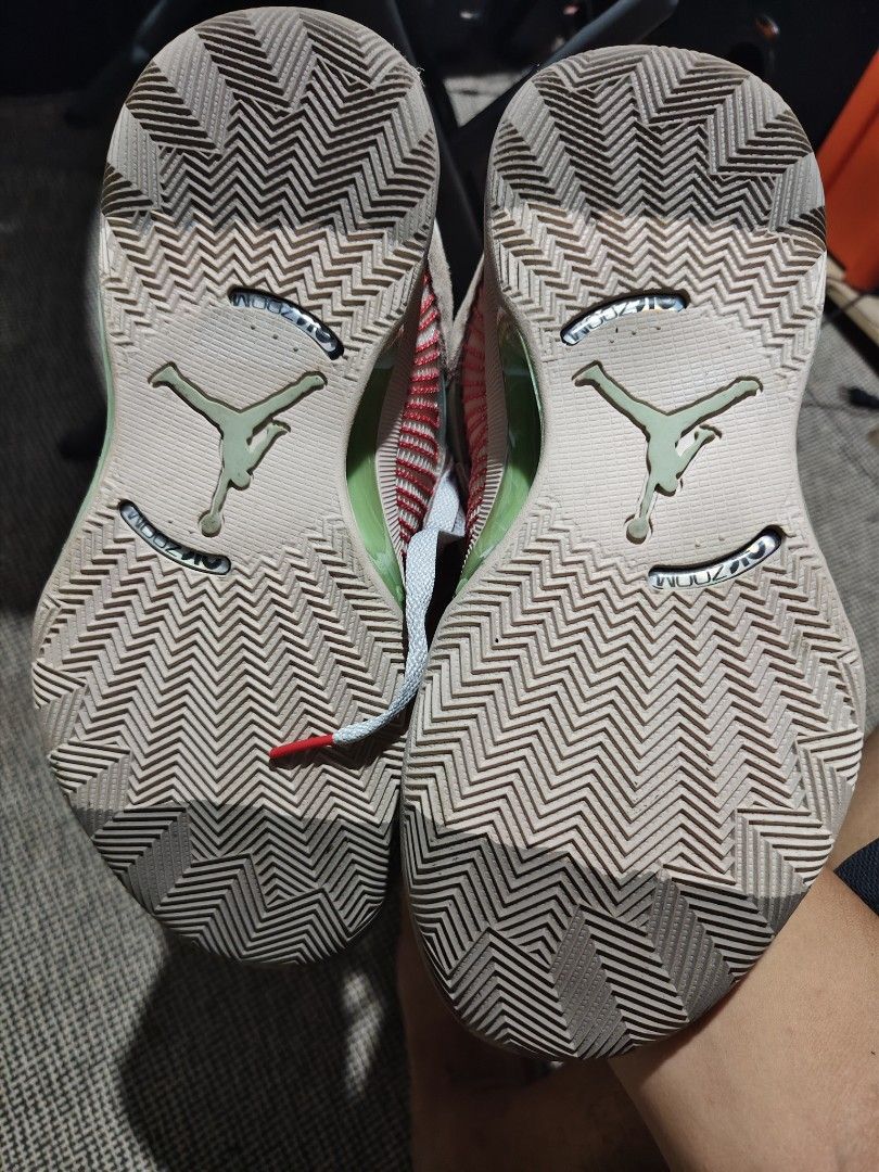 Jordan XXXV CLOT size 10US (Category: Sneakers) located in Taguig. Submitted by korilakkumachan (Listing ID 1470327110, Image 2). Description: - Model: Jordan XXXV - Colorway: Tan and red with green marble-patterned midfoot shank plate and gold embroidered Jumpman logo on the tongue - Materials: Textured mesh upper panels with suede overlays and grey laces - Size: US 10 - Condition: Clean overall shape, original tags intact inside, with light wea