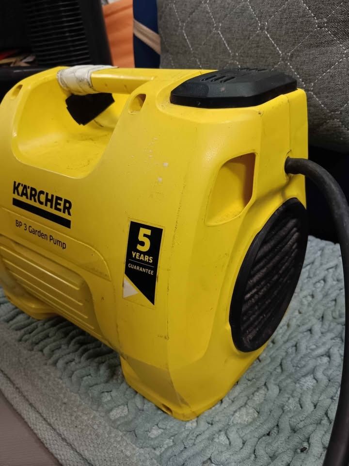KARCHER BP3G 104135 Garden Pump (Category: Construction Tools & Equipment) located in Pasay City. Submitted by enrico_appliances (Listing ID 1470191126, Image 2). Description: - Brand/Model: Kärcher BP 3 Garden Pump (1.645-380.0) - Color: Yellow and black housing with a taped-up carry handle - Power: 230-240V, 50 Hz - Performance: Max flow rate of 3,500 l/h, max head of 40 m - Condition: Used with minor scuffs and dirt, but 100% fully functional 