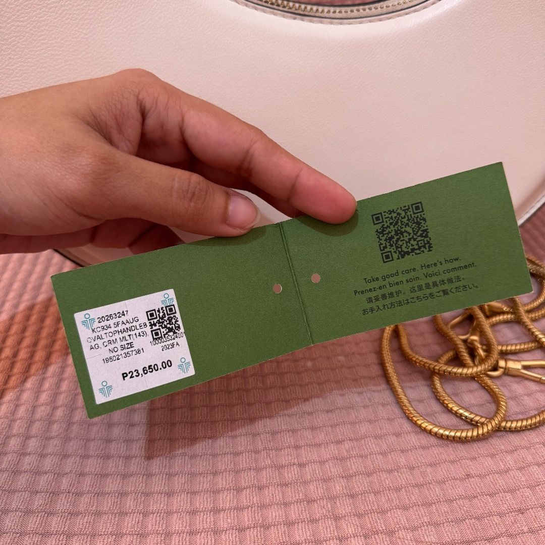 Kate Spade Expo Top-Handle Bag 2 way bag (Category: Luxury Bags & Wallets) located in Makati City. Submitted by iammvenice (Listing ID 1470197492, Image 3). Description: -Complete set (price tag, care card and dust bag) -Not bought in outlet store -no damage/scratches 100% smooth -bought for 27k in KS Retail store (see price tag) -see photos for when worn -can be worn in 2 way.