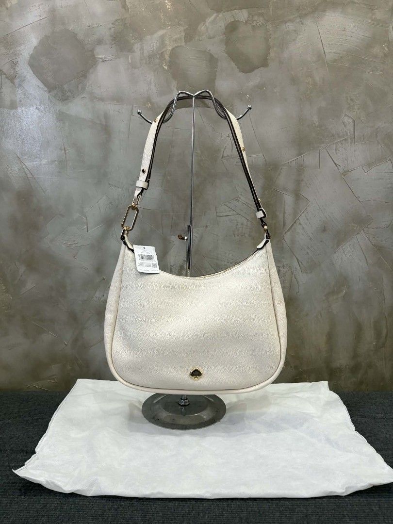 Kate Spade Kayla White Leather Convertible Bag (Category: Shoulder Bags) located in Manila. Submitted by estelpaola25 (Listing ID 1470148295, Image 1). Description: ‎🍀 AVAILABLE 🍀 NEW ARRIVAL SALE 🍀 ‎ ‎K♠️ Kayla Large Convertible Crossbody 💯💯💯❤️❤️❤️ ‎ ‎✨ from p8500 to 7500 only!!! ! 😍 ‎ ‎✅ 100% authentic, sourced directly from Canada 🇨🇦 ‎ ‎📬📬 send DM for inquiries 📬📬.