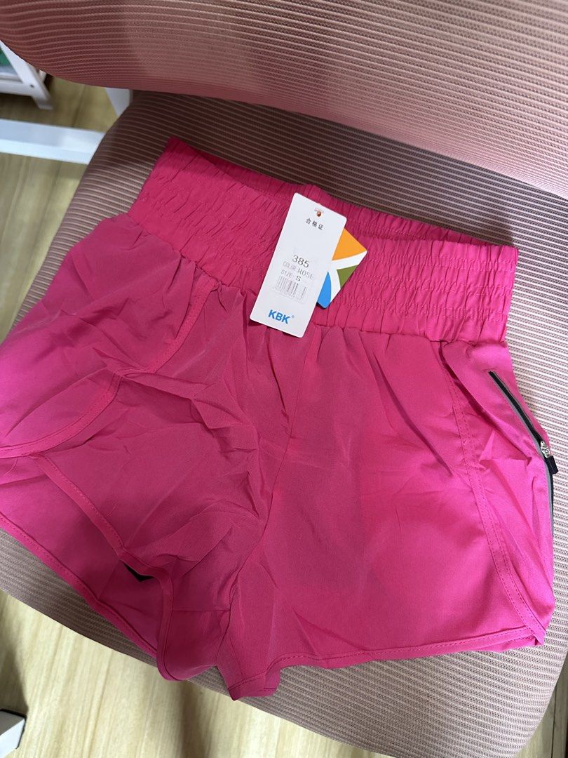 KBK Rose Pink Athletic Shorts Size S (Category: Shorts) located in Dasmarinas. Submitted by maecybee (Listing ID 1470178747, Image 1). Description: - Brand: KBK Athletic - Color: Rose Pink - Size: Small (S) - Condition: Brand new with tags (never worn) - Features: Elastic high waist with gathered detail, secure side zippered pocket - Material: Smooth and lightweight fabric - Ideal for: Running, gym workouts, or casual lounging.